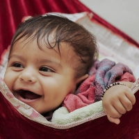How traditional Indian practices like jholi-swinging benefit babies